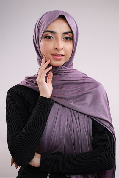 Model wearing a Dusty Purple Cotton Jersey Hijab in soft, non-slippery fabric. Full-coverage hijab for sale in Pakistan.