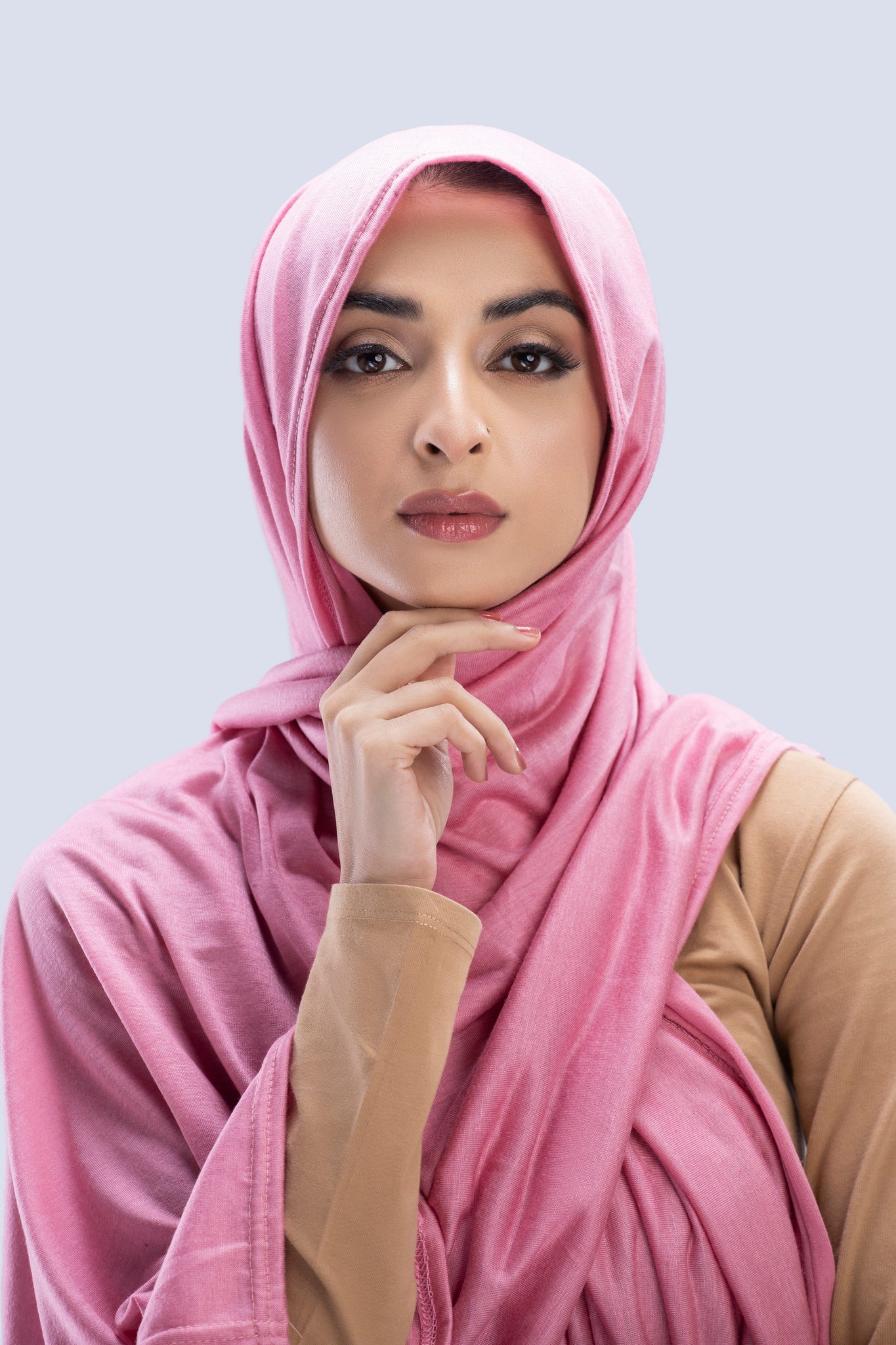 Model wearing a Blossom Cotton Jersey Hijab in soft, non-slippery fabric. Full-coverage hijab for sale in Pakistan.
