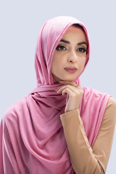 Model wearing a Cotton Jersey Hijab in Blossom color made with non-slippery fabric, Hijab for sale in Pakistan.