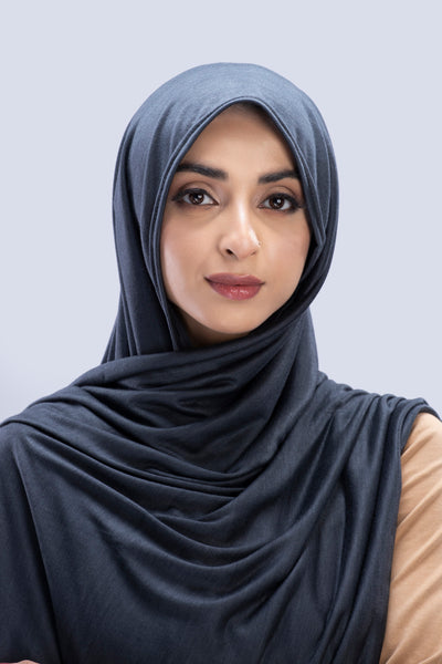Model wearing a Pebble Cotton Jersey Hijab in soft, non-slippery fabric. Full-coverage hijab for sale in Pakistan.